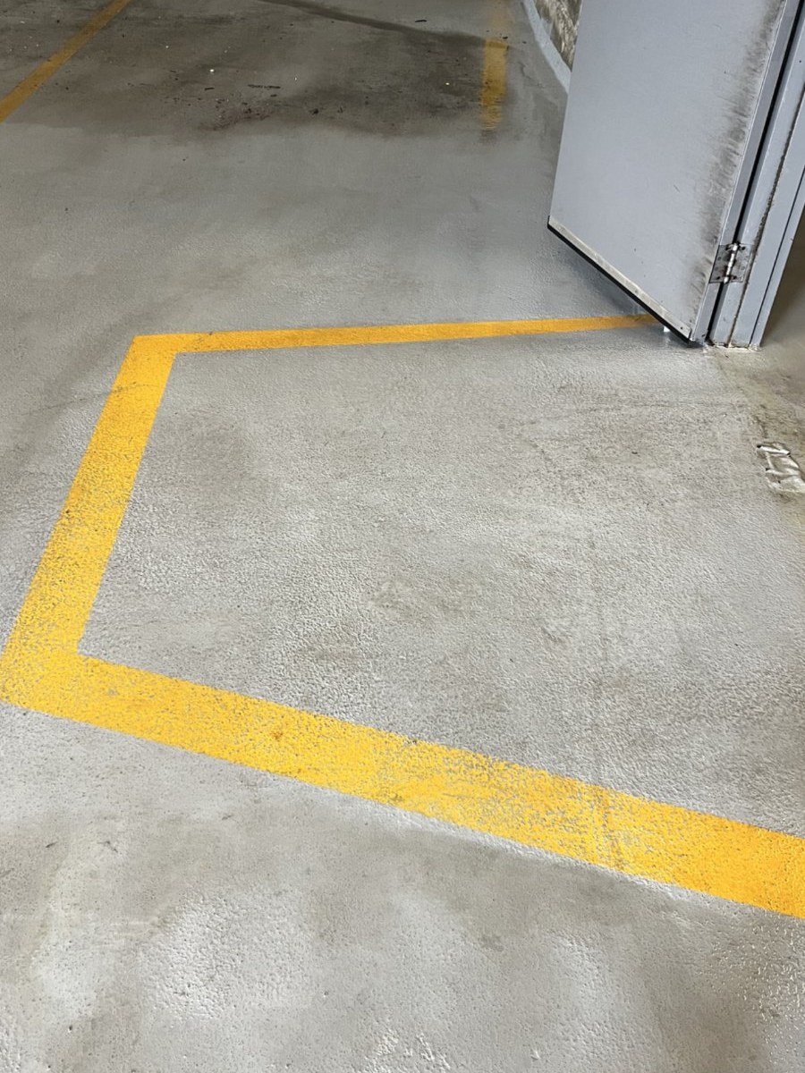 Parkade floor after pressure washing by Cleany X