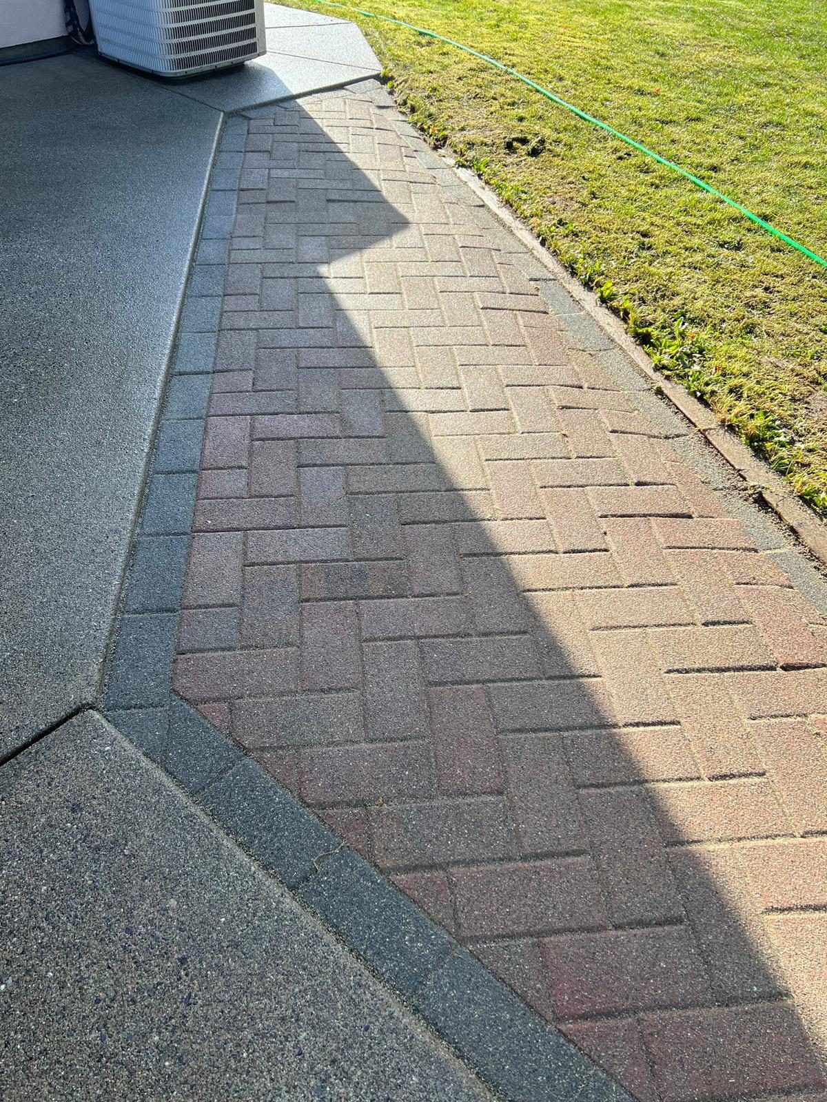 Paver path after pressure washing by Cleany X
